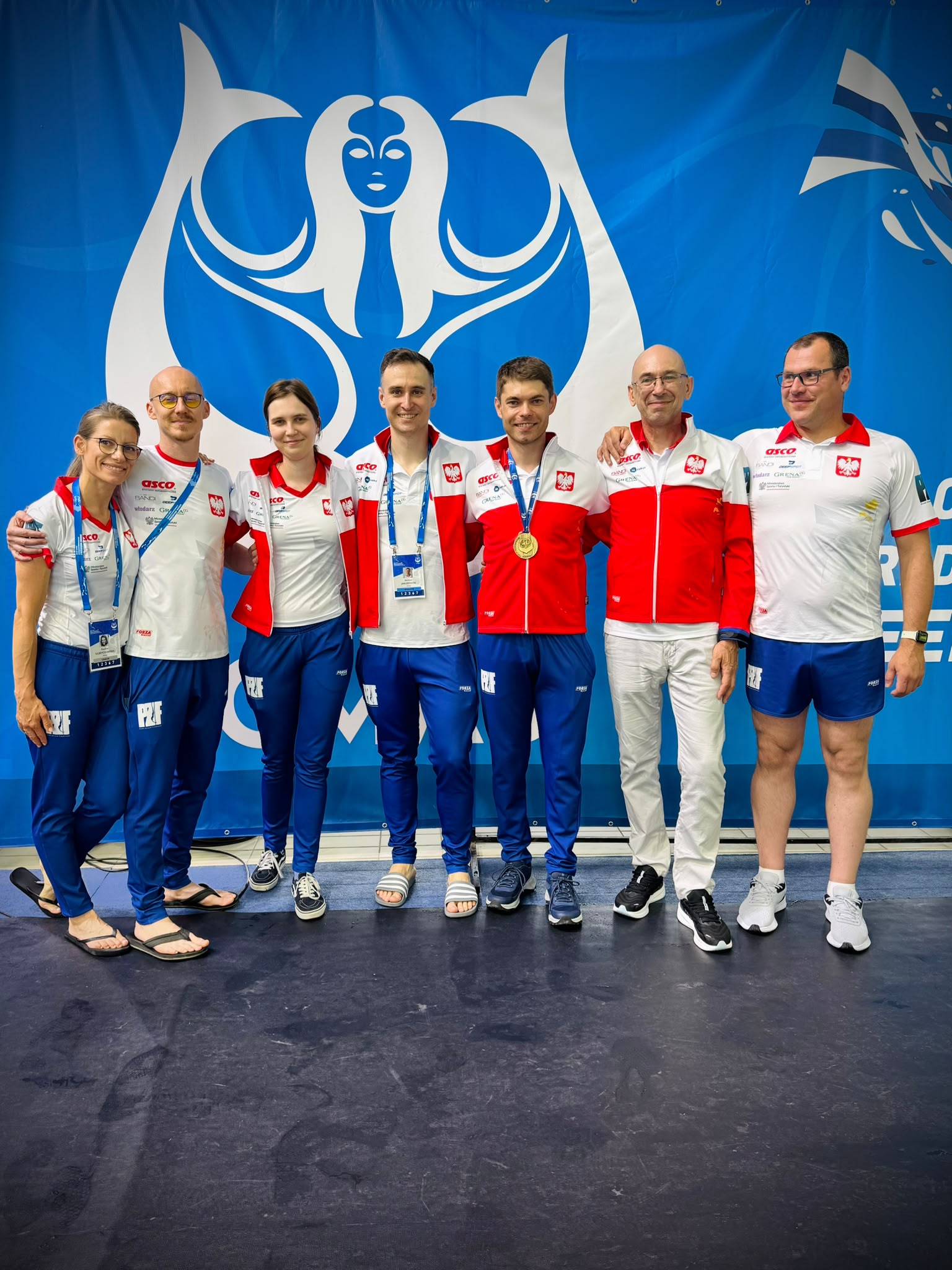 The Polish national freediving team at the 2026 CMAS World Championship in Novi Sad, one athlete wearing a gold medal